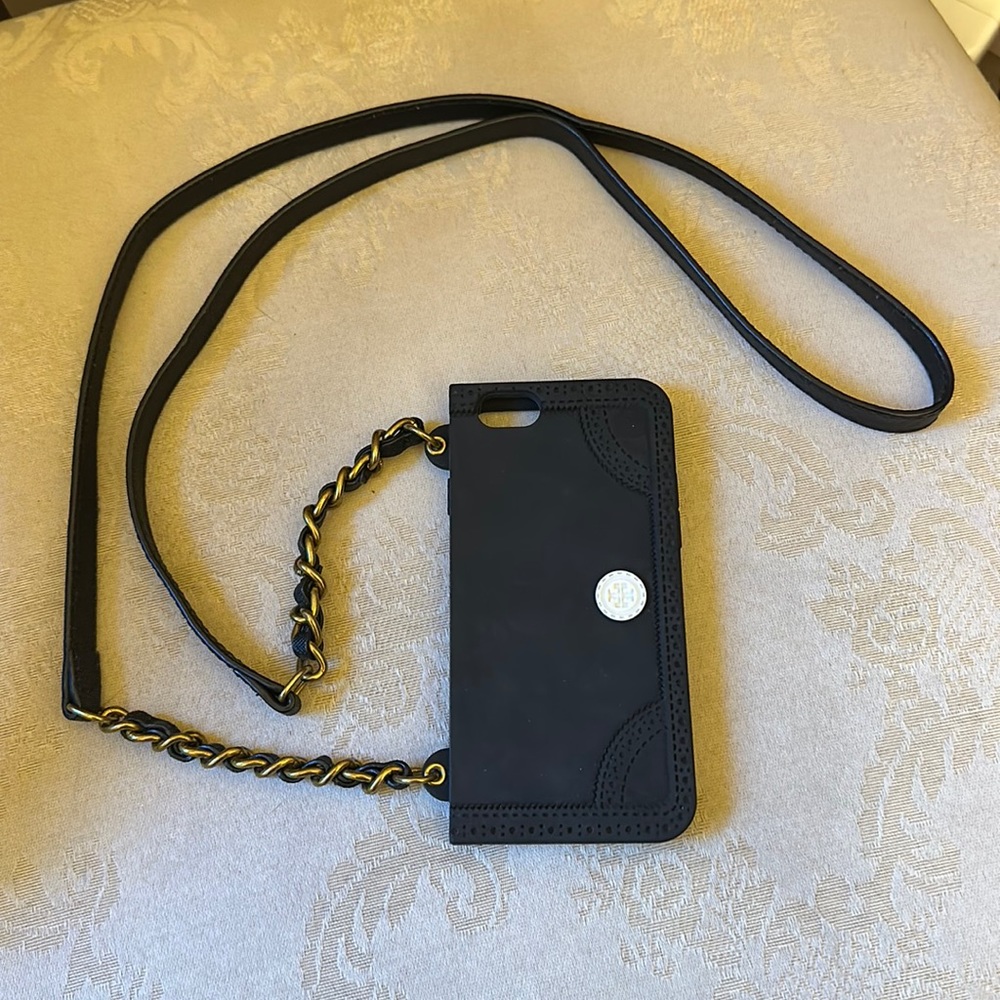 Older Tory Burch crossbody phone case, rubber with leather strap